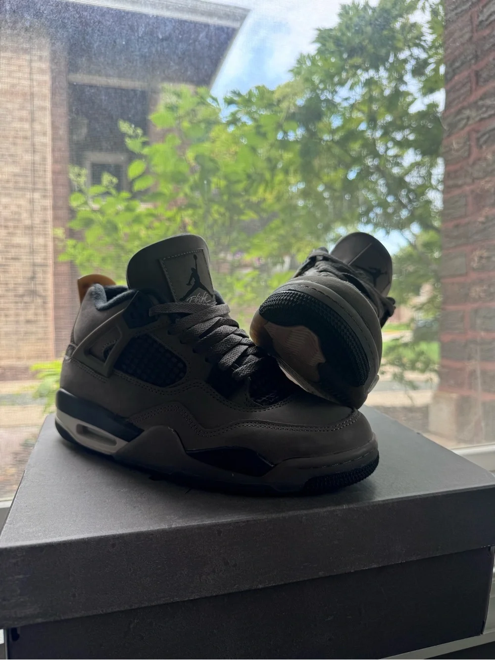 Air Jordan 4 Retro Sneakers in Dark Grey